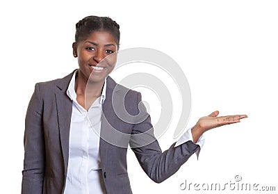 Presentation of a laughing African business woman Stock Photo