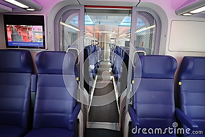 Presentation new INCG intercity with blue chairs in the second class Editorial Stock Photo