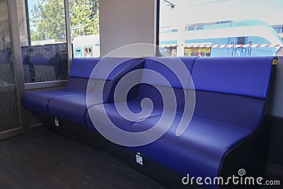 Presentation new INCG intercity in the Netherlands Blue leather sofa seats in second class Editorial Stock Photo