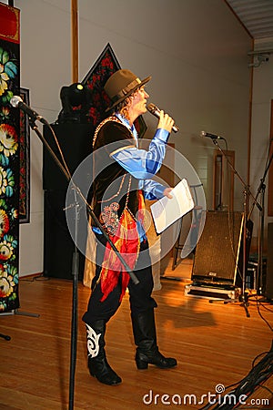 Presenter, compere, master of ceremonies - actor michael smiles on the stage of the country club Giving Editorial Stock Photo