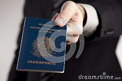 Presenting a Brazilian Passport. Stock Photo