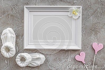 Presents set for baby shower with frame gray stone background top view mockup Stock Photo