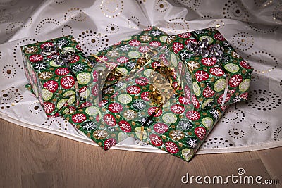 Presents under the Christmas tree on floor Stock Photo