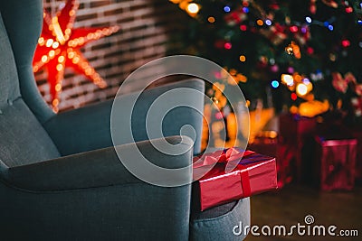 Presents under the Christmas tree lights background Stock Photo