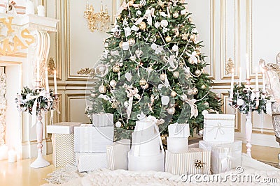 Presents under Christmas Tree in living room. Family Holiday New Year at Home Stock Photo