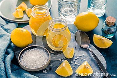 Preserved, salted canned lemons, lemon pickle Stock Photo