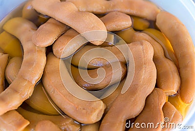 Preserved Tamarind in syrup. Tamarind pickled fermented, Pickled fruits or preserved sweet fruits. Pickled tamarind, preserved swe Stock Photo