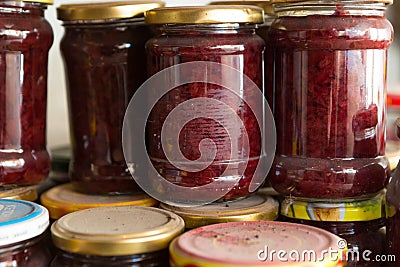 Preserves in jars in home basement Stock Photo