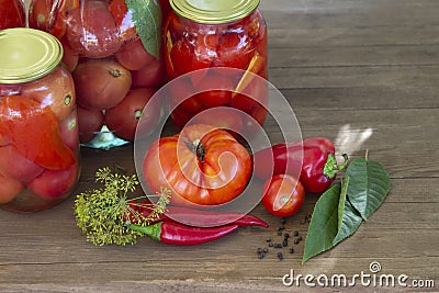 Preserves vegetables in glass on wood background, marinated fermented and pickled fermer food Stock Photo