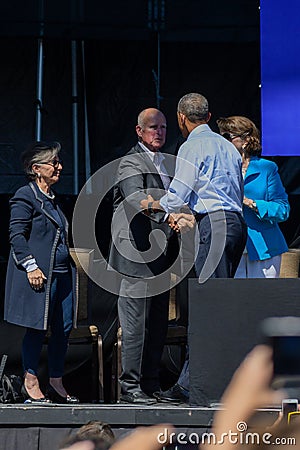 President Obama shakes Governor Jerry Brown's hand at 20th Annual Lake Tahoe Summit 1 Editorial Stock Photo