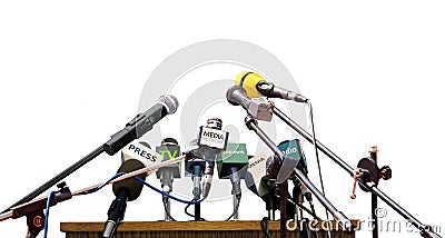 Press conference microphones on white background Stock Photo