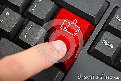 Press Facebook Thumb Up Like Button Stock Photo