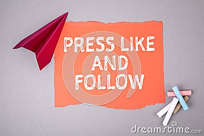 PRESS LIKE AND FOLLOW concept. Text on note sheet, paper plane, symbol of gaining goals Stock Photo