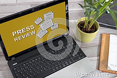 Press review concept on a laptop Stock Photo