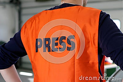 Press Safety Vest Stock Photo