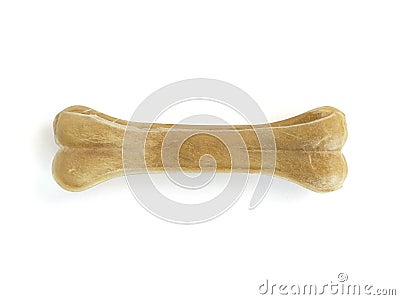 Pressed bone shaped Teether for dog puppies isolated on white background. Close up. Pet Dog Toy Teether, Molar Teeth Cleaner, Stock Photo