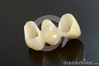 Pressed ceramic teeth Stock Photo