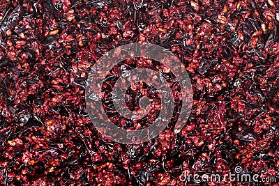 Pressed grape pomace, seeds and skins. Winemaking background Stock Photo