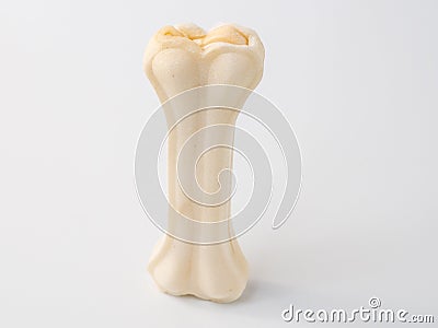 Pressed rawhide bone shaped dog chews. Stock Photo