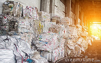 Pressed rubbish for further processing, sorting and processing of garbage, pressed rubbisch, sun Stock Photo
