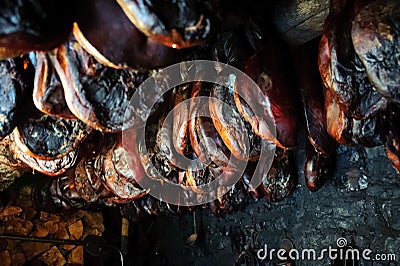 Pressed smoked ham in smokehouse Stock Photo