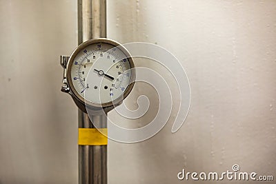 Pressure analogue gauge in psi and kPa Stock Photo