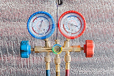 Pressure gauge for auto air conditioner recharge. Stock Photo
