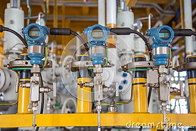 Pressure transmitter for monitor and sent measuring value to programmable logic controller PLC to control oil and gas process Stock Photo