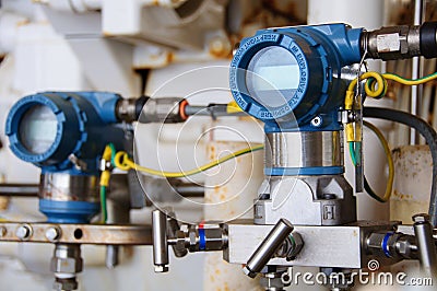 Pressure transmitter in oil and gas process , send signal to controller and reading pressure in the system Stock Photo