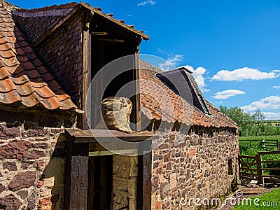 Preston Mill watermill on the River Tyne, East Linton, Scottish Borders Editorial Stock Photo