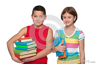 Preteen boy and girl with books Stock Photo