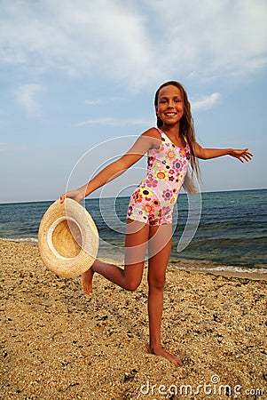 Preteen girl on sea beach Stock Photo