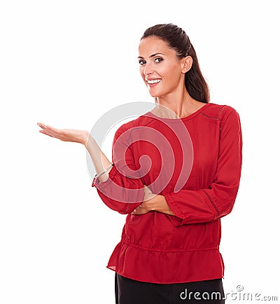 Pretty adult brunette holding her right palm up Stock Photo