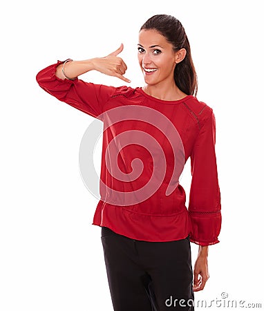 Pretty adult female with call gesture Stock Photo