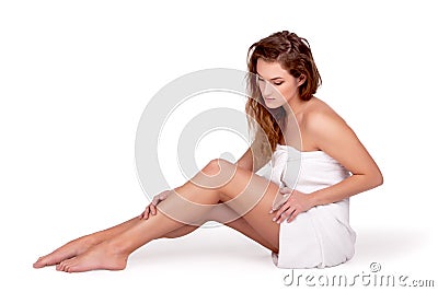 Pretty adult girl with perfect legs with towel Stock Photo