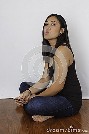 https://thumbs.dreamstime.com/x/pretty-asian-woman-smoking-electronic-cigarette-young-sits-cross-legged-wood-floor-as-puffs-e-aka-vape-model-44041642.jpg