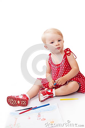 Pretty baby girl with pencils and album Stock Photo