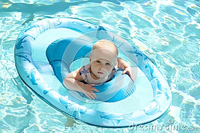 Pretty Baby Girl Swimming in Pool in Boat Stock Photo