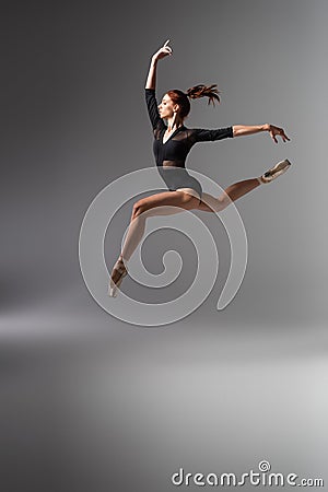 pretty ballerina in pointe shoes and Stock Photo