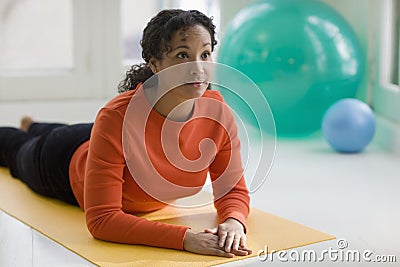 Pretty black woman practicing yoga Stock Photo