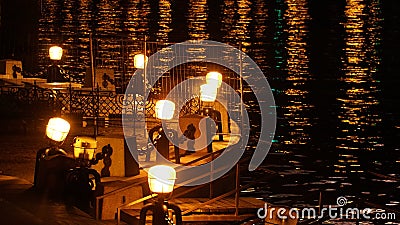 Lake at night with lights Stock Photo