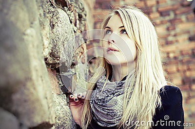 Pretty blond woman portrait looking up Stock Photo