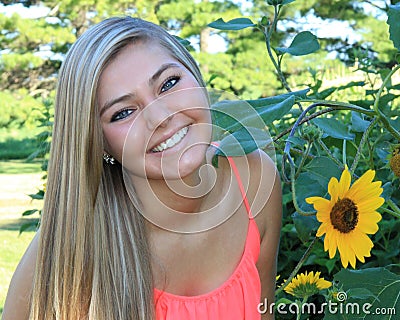 Pretty Blonde High School Senior Girl Outdoor Stock Photo