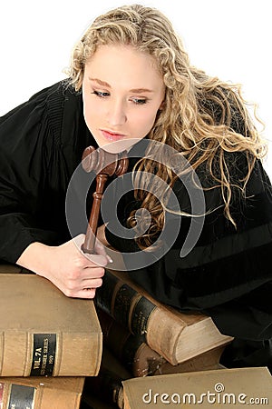 Pretty Blonde Woman Judge with Gavel and 70 Year Old Law Books Stock Photo