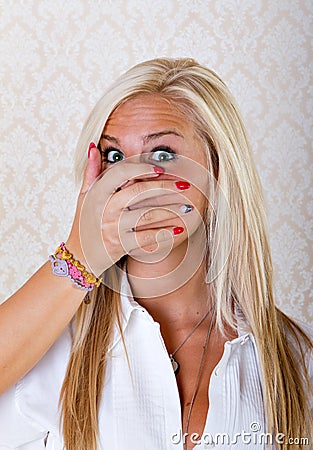 Pretty blonde woman raped Stock Photo