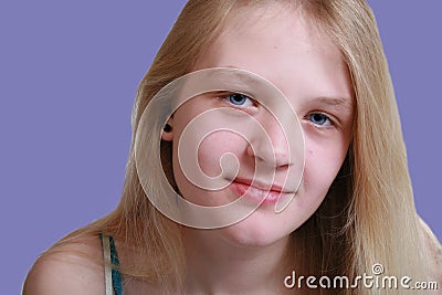 Pretty blue eyed teen Stock Photo