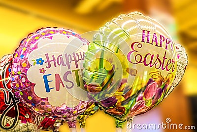 Pretty bright Easter Balloons against blurred background Stock Photo