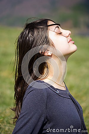 Pretty brunette outdoors Stock Photo