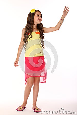 Pretty brunette slender child girl artistically posing and happy Stock Photo