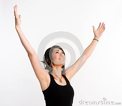 Pretty Brunette Woman Holds Arms Outstretched Jubilant Looking Up Stock Photo